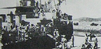 1946年应中共要求，广东东江纵队乘美国运输舰前往烟台整编，后参与山东内战